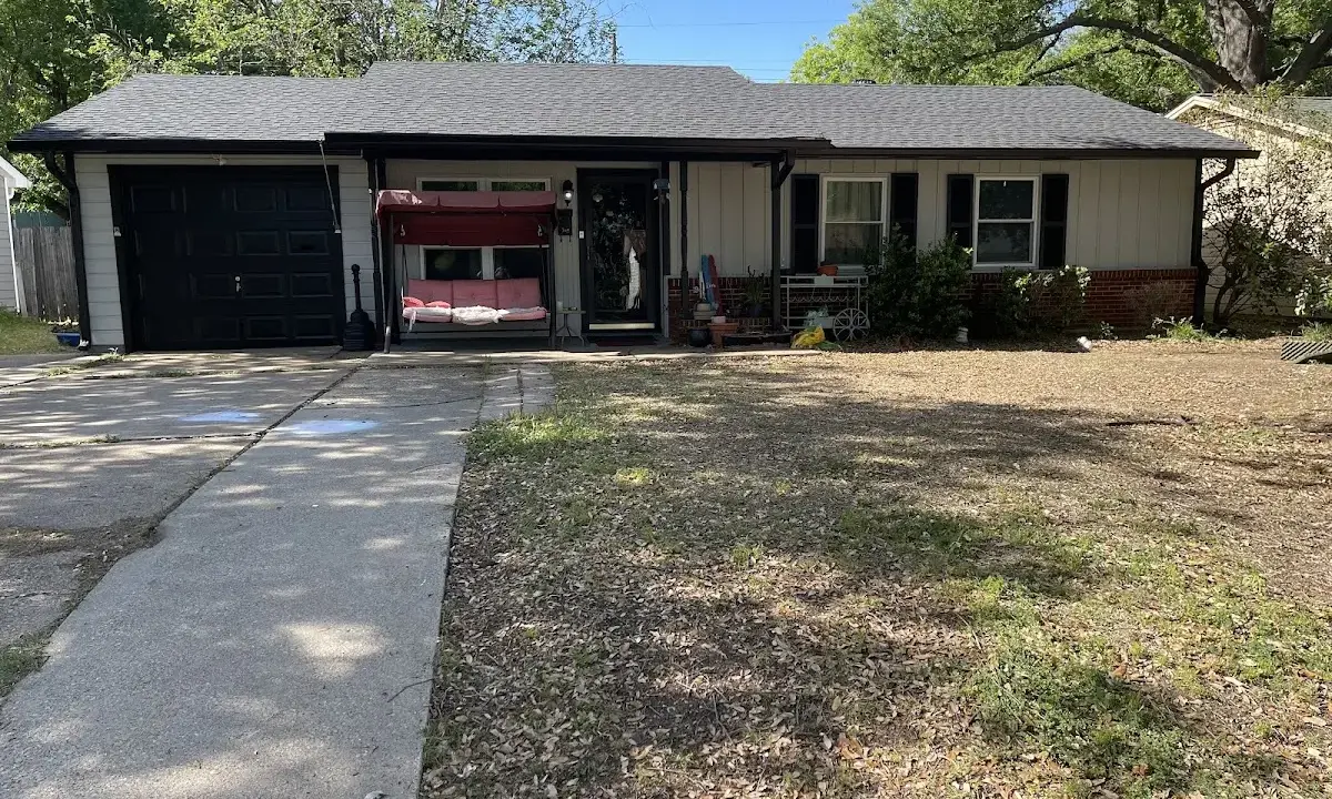 Asphalt Shingle Roof Repair crew at work on a residential roof in Carrollton